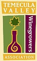 Logo with a wine bottle and leaf, labeled Valley Winegrowers.