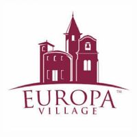 Logo of Europa Village with a stylized building and text.
